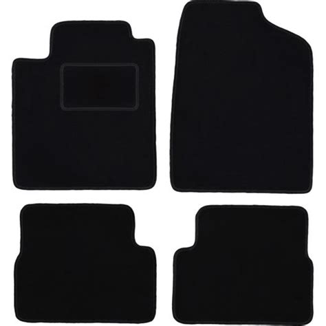 Nissan Micra K12 interior con alfombrillas de moqueta