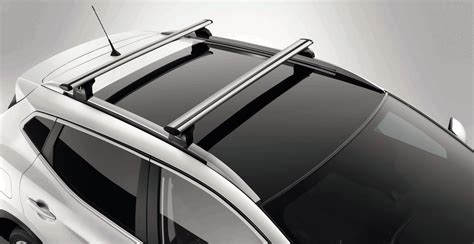 Nissan Qashqai 2007 con barras de techo y cofre